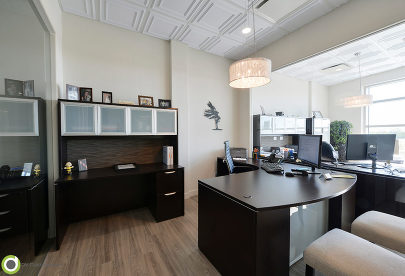commercial renovation features vinyl plank flooring and suspended ceilings