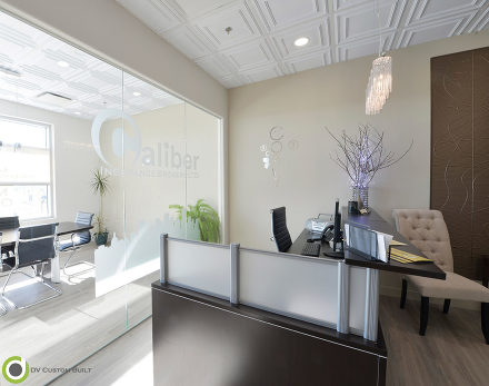 commercial renovation features vinyl plank flooring and suspended ceilings